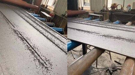 普華重工機(jī)械工程師快速解決輥道拋丸機(jī)堆砂問(wèn)題